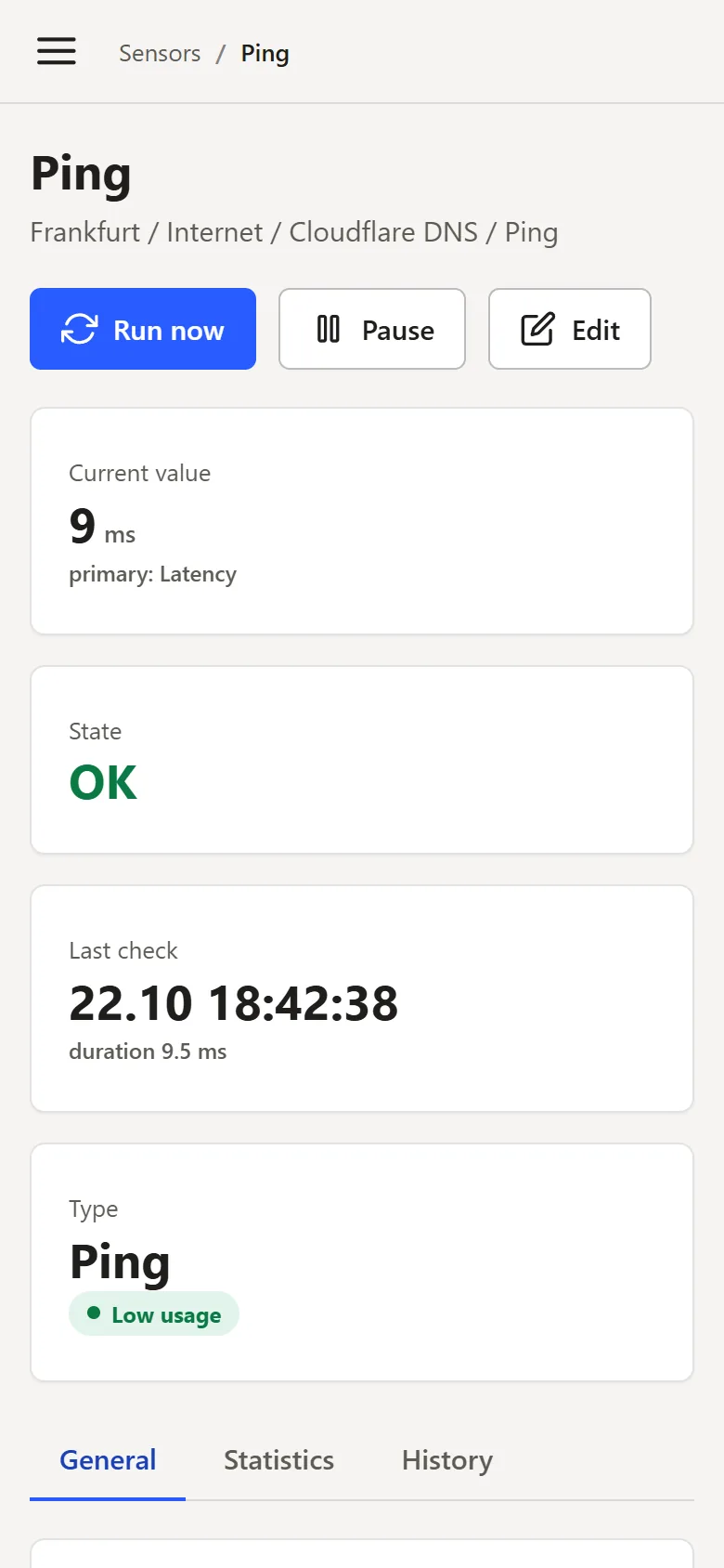 A Matmon sensor with its latency chart on a phone